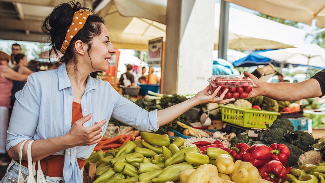Farmer preparing pre-orders at market